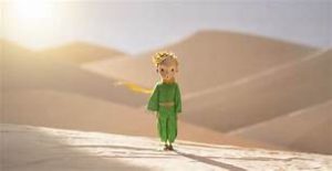 Boy walking in desert