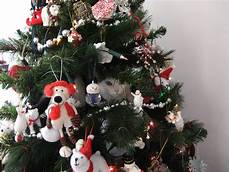 Cat in middle of Christmas tree