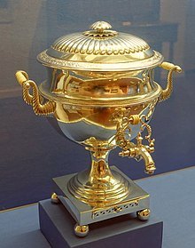 A fancy gold samovar