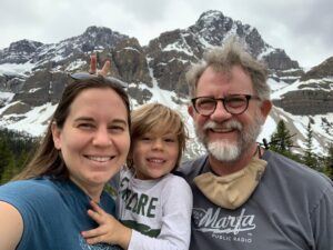 Susan, Jake, Tom Schaff, mountains in background