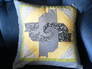 Pillow with four cat design