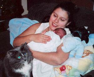 Mom, new baby, and cat