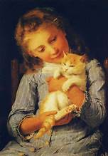 Young girl holding orange cat