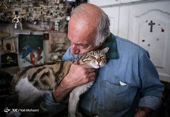 Man loving his cat