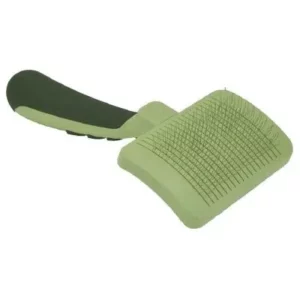 Self-cleaning slicker brush