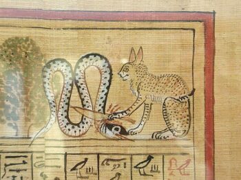 Egyptian drawing of cat killing snake